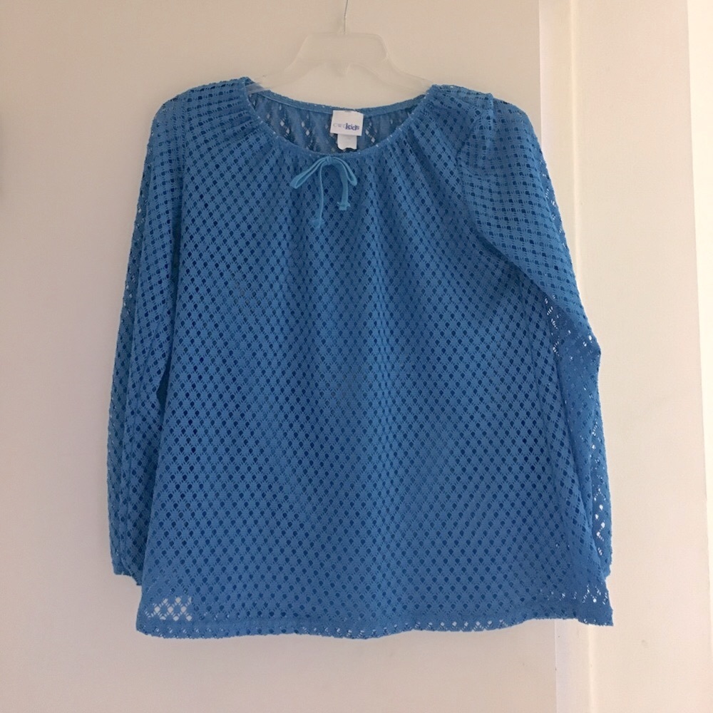 Kids swim cover up top. Great color. Good deal